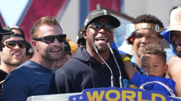 Feb 16, 2022; Los Angeles, CA, USA; Los Angeles Rams coach Sean McVay (left) and defensive coordinator Raheem Morris react during Super Bowl LVI championship rally at the Los Angeles Memorial Coliseum.
